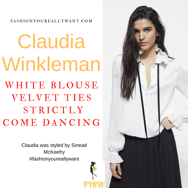 Claudia Winkleman Wore This on Strictly Come Dancing Semi Final Results December 2022 where to get her outfits white ruffle blouse black velvet ties black trousers