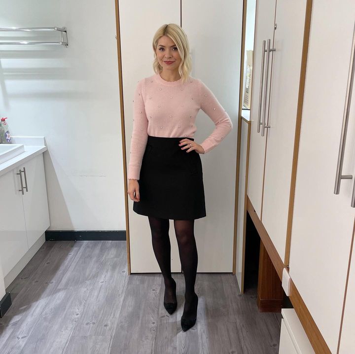 where to get all Holly Willoughby This Morning outfits pink crystal embellished jumper black mini skirt black suede court shoes 18 January 2023 Photo Holly Willoughby