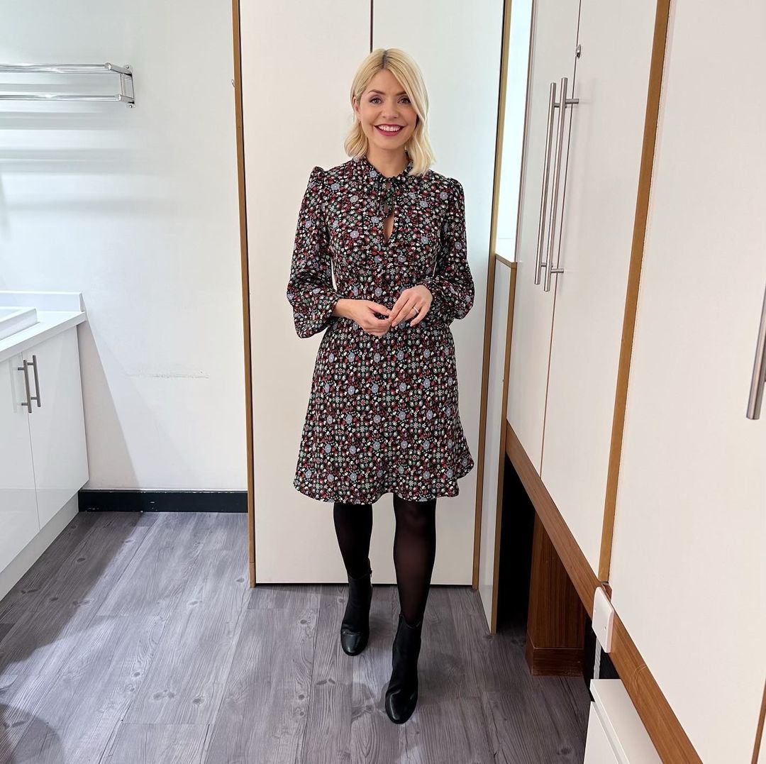 where to get all Holly Willoughby This Morning outfits dresses black gardenia tie neck dress black ankle boots 7 March 2023 Photo Holly Willoughby